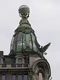 Finial figures and globe, Singer House. Saint Petersburg, 1902–1904