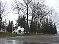 Sculpture of a soccer ball near the sports complex