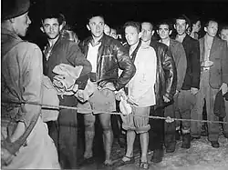 Illegal immigrants being detained from Af Al Pi Chen