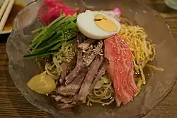 Hiyashi chūka is a cold seasonal dish offered during the summer