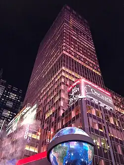 The building viewed from ground level at night