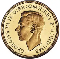 Gold coin showing a man's bust