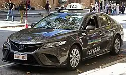 Toyota Camry Hybrid operated by TriColor Taxis