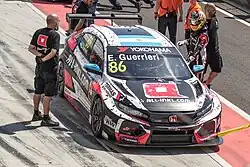 A Honda Civic Type R TCR (FK8), in the World Touring Car Cup pits at Hungaroring