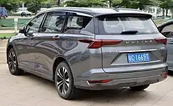 Rear three-quarter view of a five-door road car.