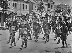Troops from 'A' Company, 15th Battalion march through Melbourne on 17 December 1914.