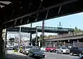 Underneath the IND Rockaway Line looking towards the Fulton Street Line crossing over the derelict Rockaway Beach Branch