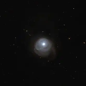 2MASX J05210136-2521450.[32]