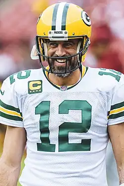 Aaron Rodgers standing in uniform
