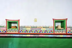 Wall painted in Al-Qatt Al-Asiri art