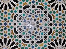Eight-pointed and sixteen-pointed star motifs in zellij (azelujos) tilework at the Sala del Mexuar in the Alhambra in Granada, Spain (14th century)[101]