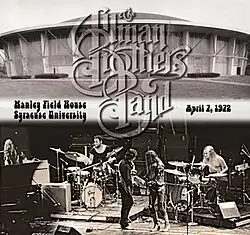 The Allman Brothers Band onstage, with Manley Fieldhouse in the background