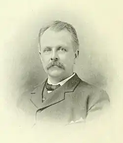 A black and white photograph of Amasa J. Parker Jr.