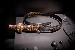 Decorated bent sword, part of the finds in a noble's grave at Oss (The Netherlands). Circa 826-600BC.