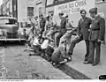 Children and soldiers outside the American Red Cross Service Club at Centenary Hall during World War II