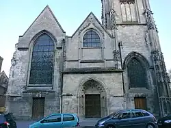 The Gothic façade of the church of Saint-Leu
