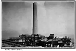 Column projecting above buildings