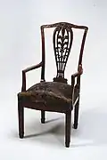 Colonial Revival armchair (1886–88), by Francis H. Bacon for A. H. Davenport and Company, Metropolitan Museum of Art.