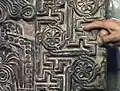 Khachkar with swastikas and hexafoils in Sanahin, Armenia