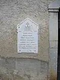 War memorial plaque on the church