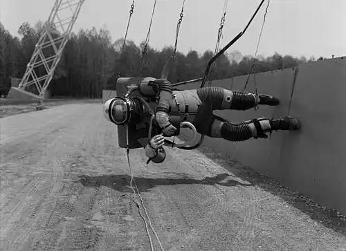 Astronaut in the pressurized spacesuit
