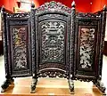 A wooden folding screen from the Nguyễn dynasty, on display at Museum of Vietnamese History.