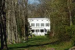 Tree-lined former driveway from Oldwick Road