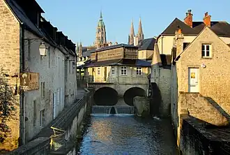The historic centre, the Bayeux Cathedral, the Aure and tourist office