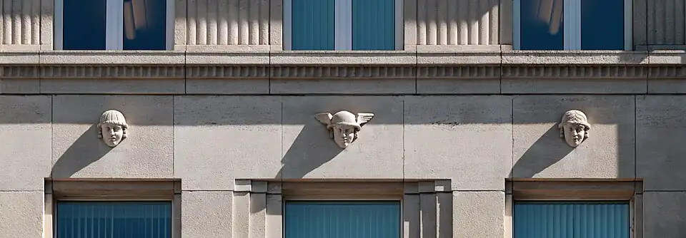 Art Deco mascarons of the Banque Buurmans (Rue Royale no. 71), Brussels, Belgium, by G.J. Maugue, 1927