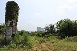 The chimney of the local inn in foreground, with Bellefonte Nuclear Generating Station in the background