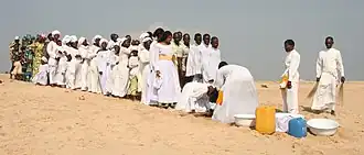Baptism ceremony of the Celestial Church of Christ in Cotonou, Benin.