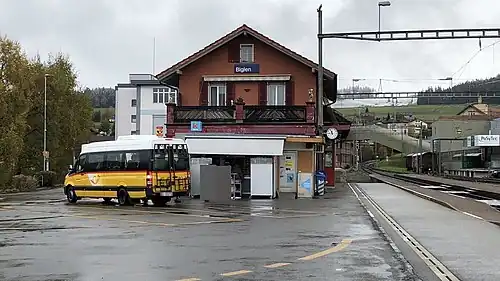 Two-story station building with gabled roof