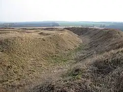 Earthen ramparts in a field