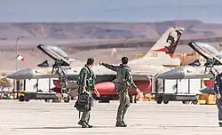 Two Israeli pilots in front of their F-16C jets of 115 Squadron "Flying Dragon" at Ovda in October 2021