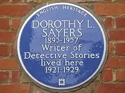 The plaque reads: English Heritage. Dorothy L. Sayers 1893–1957 Writer of detective stories lived here 1921–1929