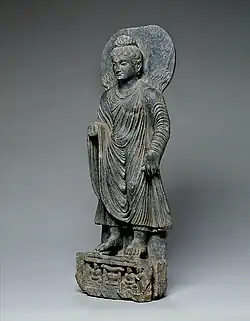 Statue of Buddha performing the Miracle of Shravasti, Gandhara, 100-200 CE.