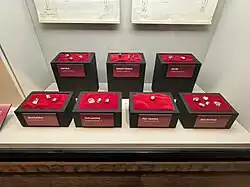 Seven sets of rounds, one from each of the victims.