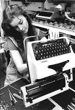 One of 17,000 assembly workers at Robotron in 1987 working a weekend to make typewriters
