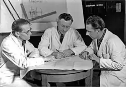 Image 1Engineers conferring on prototype design, 1954 (from Engineer)