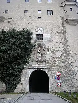 The main gate, approached from the East. Above the gate is a statue of St Willibald. The gate gives entrance to the gate hall which leads to the inner courtyard