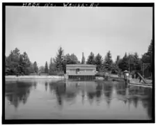 Gate house above the power plant with the diversion channel in the foreground