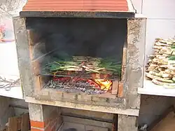 Calçots roasting during a calçotada
