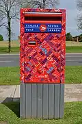 Post box in Markham, Ontario, Canada, decorated with postal codes