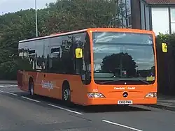 A Mercedes-Benz Citaro in orange and red livery from 2021 to present-day.