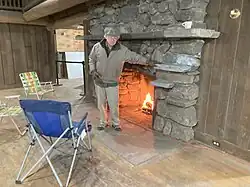 Cabin interior with working fireplace (November 2024)