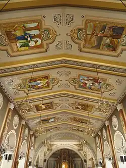 The church ceiling is painted with various images of Jesus' ministry according to the Bible.