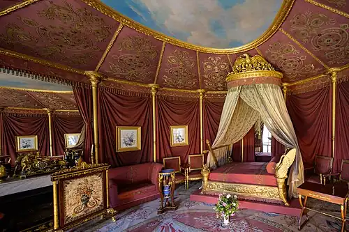 Empress Joséphine's Bedroom in Château de Malmaison, Rueil-Malmaison, France, by Charles Percier and Pierre-François-Léonard Fontaine, 1800-1802[77]
