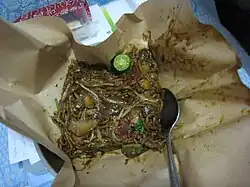 Singaporean-style char kway teow, cooked with a mixture of yellow wheat noodles and flat rice noodles