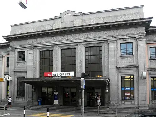Grand entrance with two-story windows