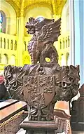 Christ Church, Welshpool. Carved Pew end with Powis arms and crest